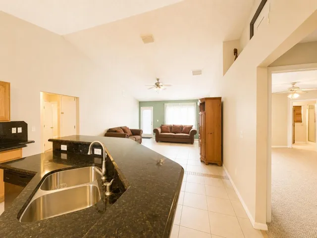 view from kitchen looking into the living area