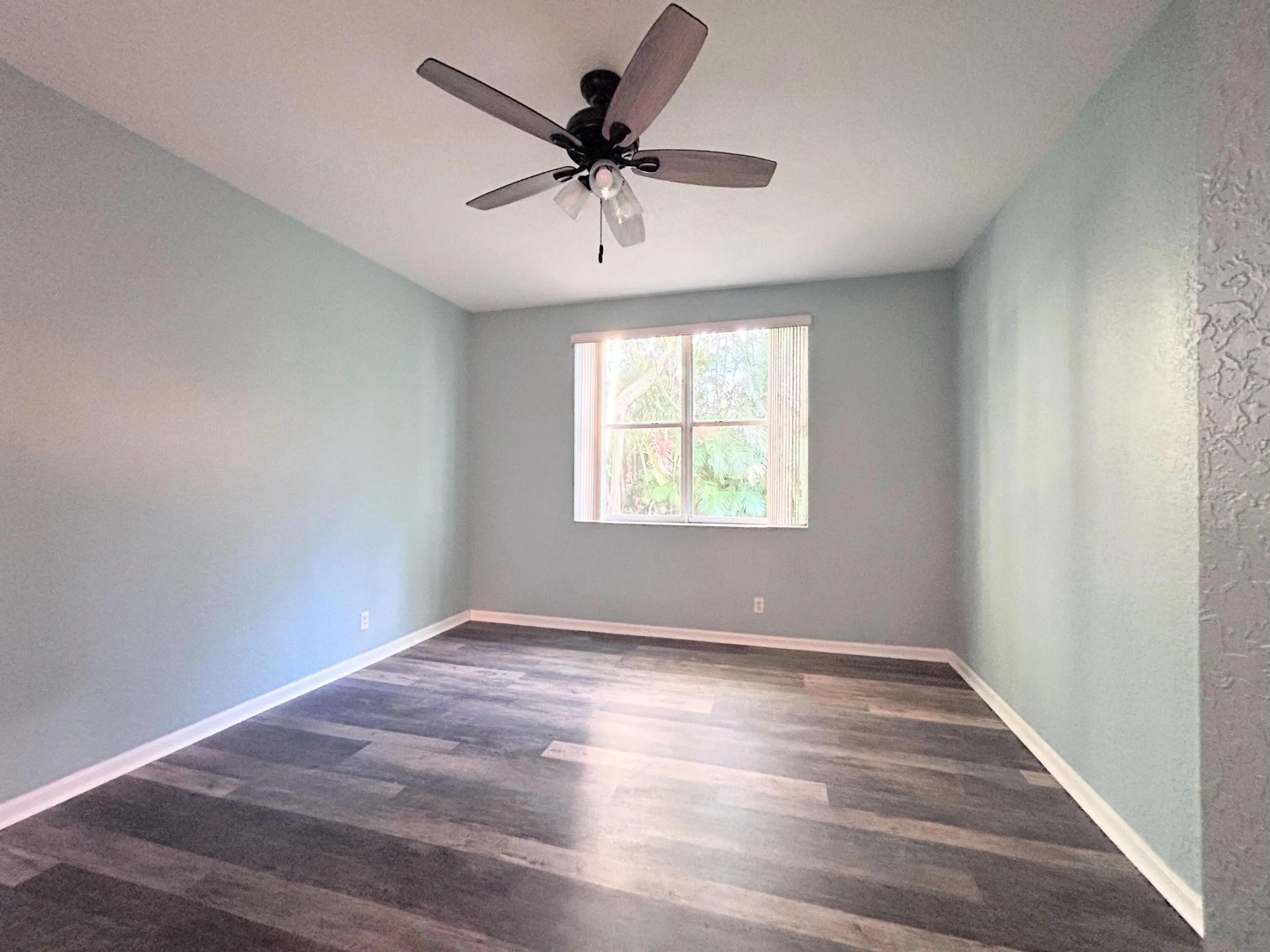 Walk-in closet in primary bedroom