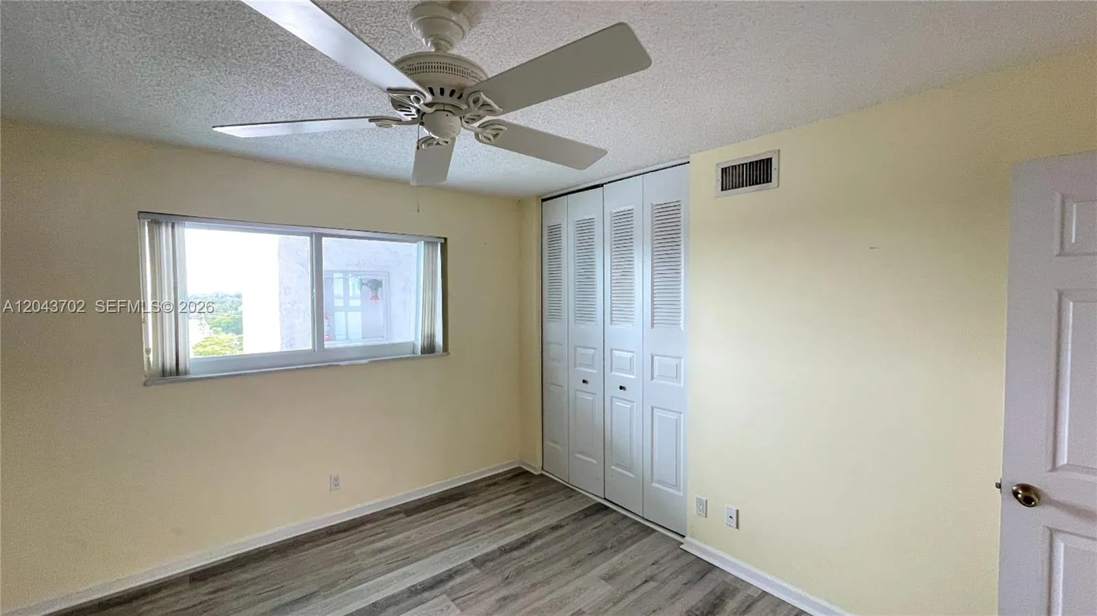 Second bedroom. Enhanced photo.