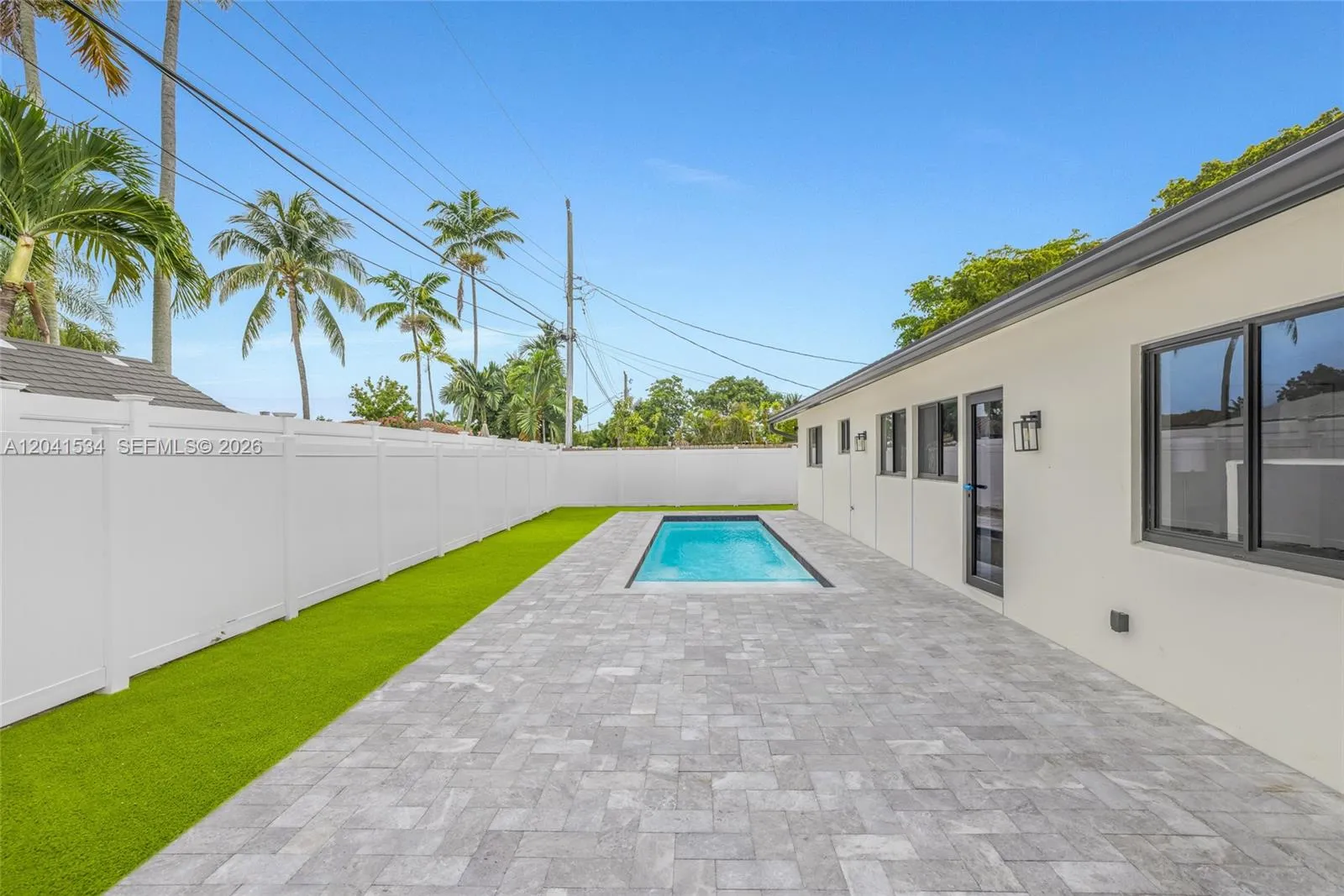 Please Note: The backyard and pool images are architectural renderings intended to illustrate the completed design of the pool, pool deck, and outdoor living area. Final finishes, materials, and landscaping may vary slightly upon completion. Please contact the listing agent for additional details.