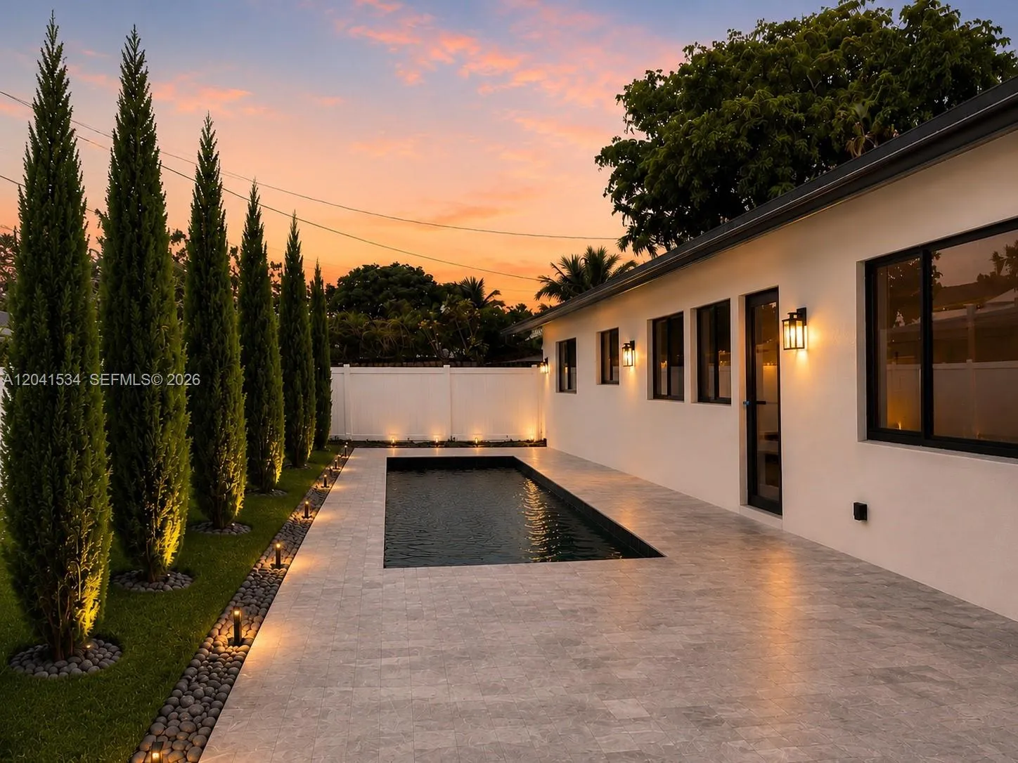Please Note: The backyard and pool images are architectural renderings intended to illustrate the completed design of the pool, pool deck, and outdoor living area. Final finishes, materials, and landscaping may vary slightly upon completion. Please contact the listing agent for additional details.