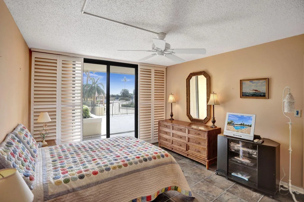Primary bedroom with patio access