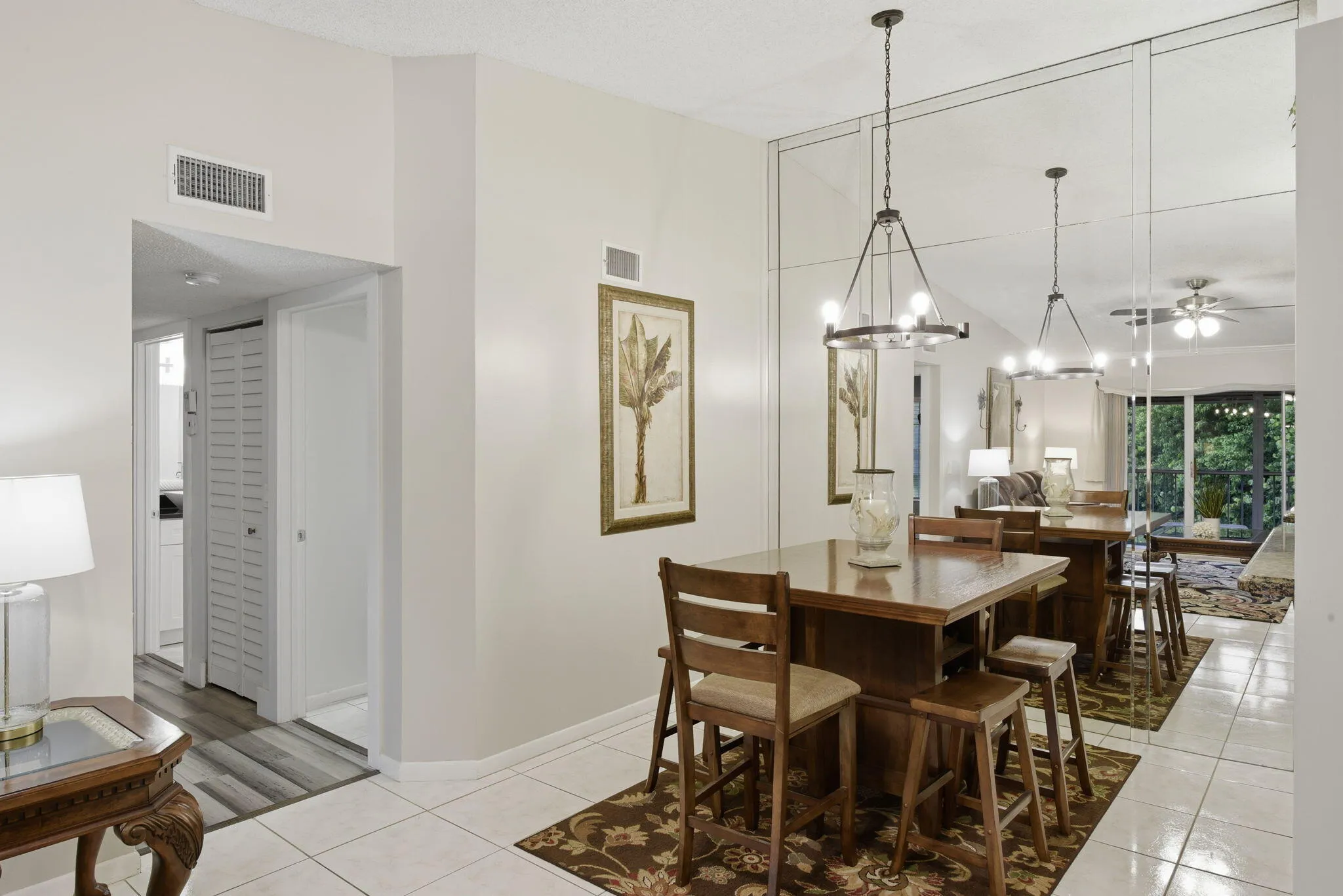 Dining with view of hallway to bedrooms