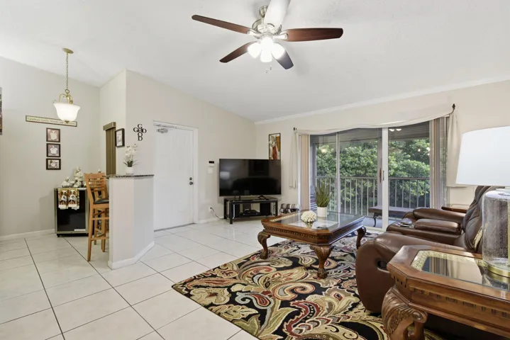 Living area with view of kitchen eat in nook