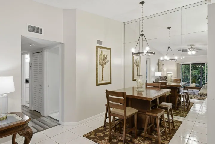 Dining with view of hallway to bedrooms