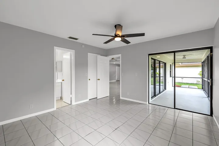 PRIMARY BEDROOM- Access to patio. Walk in closet.