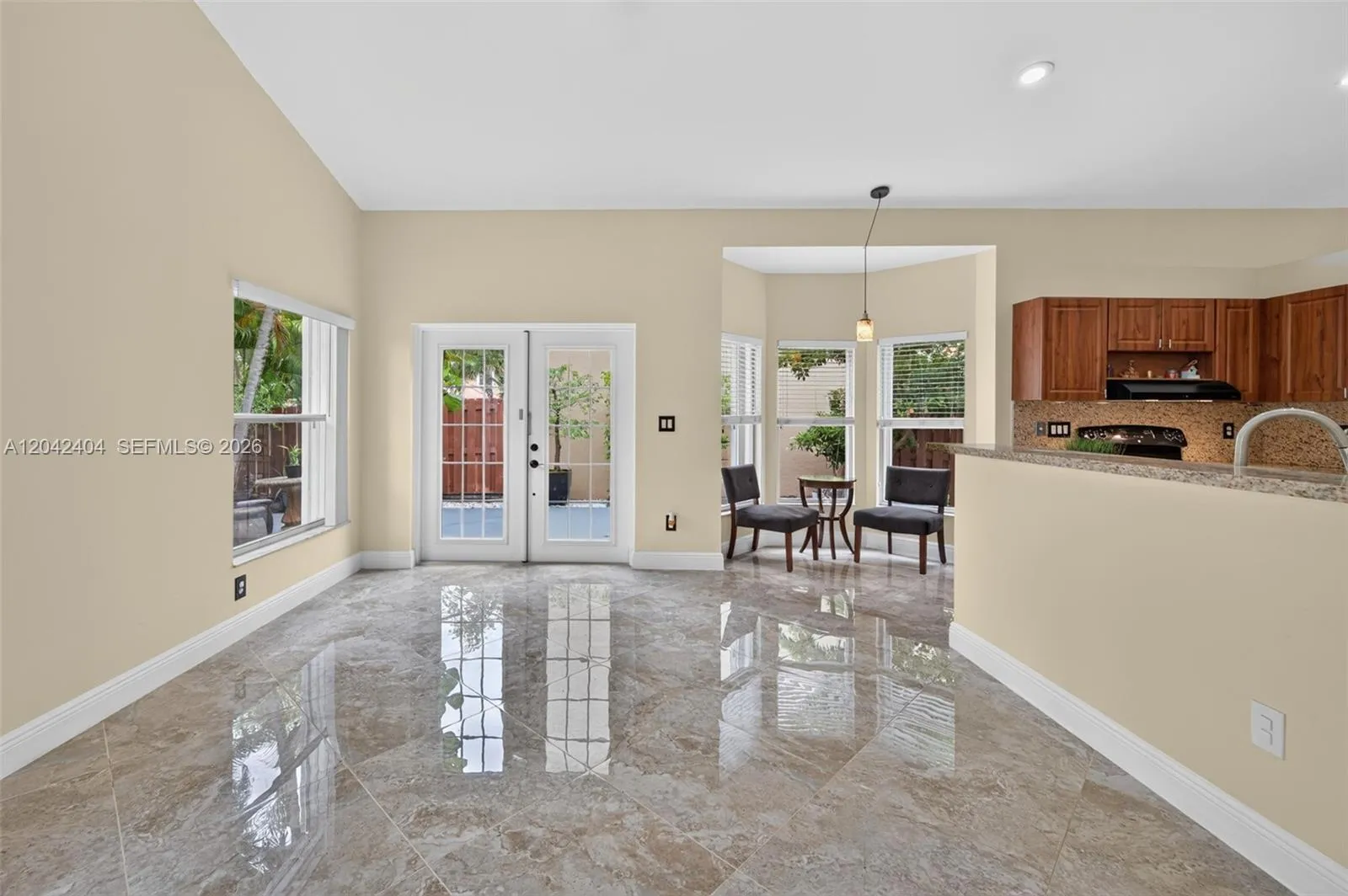 French doors lead to tranquil patio area.