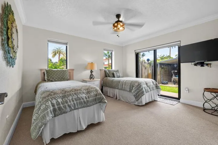 third bedroom with slider door