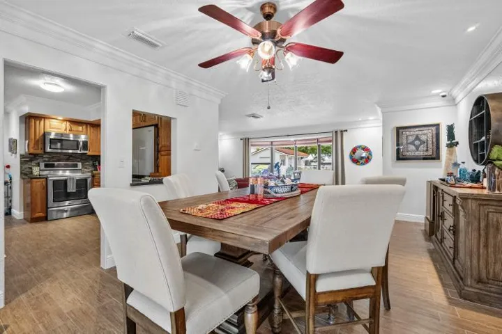 dining room with view of entrance to kitchen