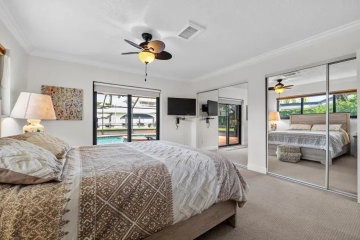 second berdroom with ceiling fan