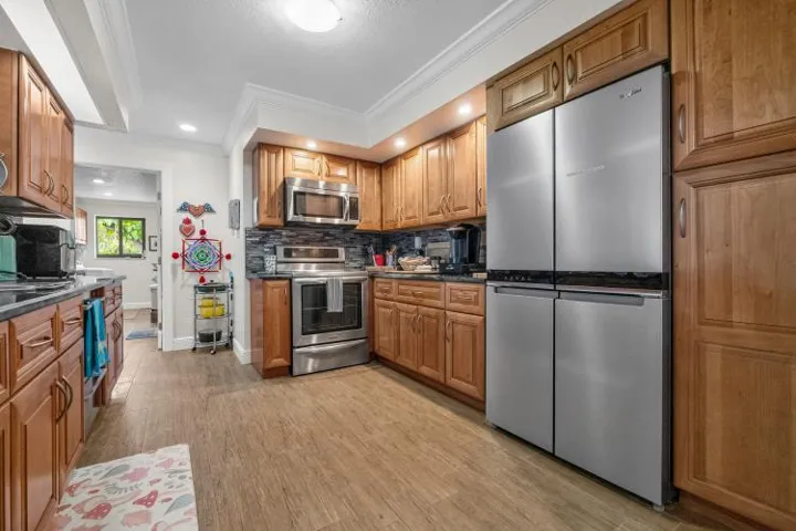 kitchen with access to the laundry room and garage