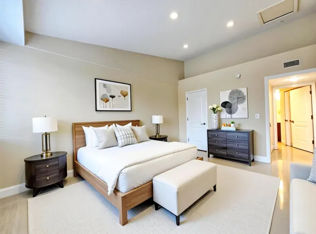 THE BEDROOM IS LARGE ENOUGH FOR A KING SIZE BED AND HAS TWO SETS OF CLOSETS (ONE WHICH IS A WALK-IN CLOSET) virtually staged