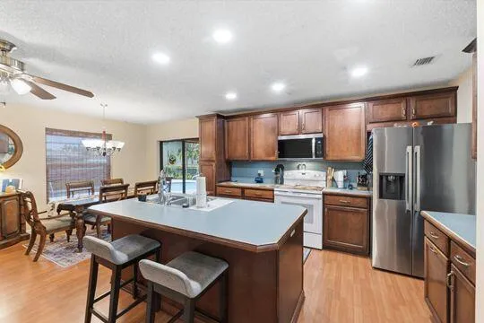 Kitchen adjoins family/dining room areas