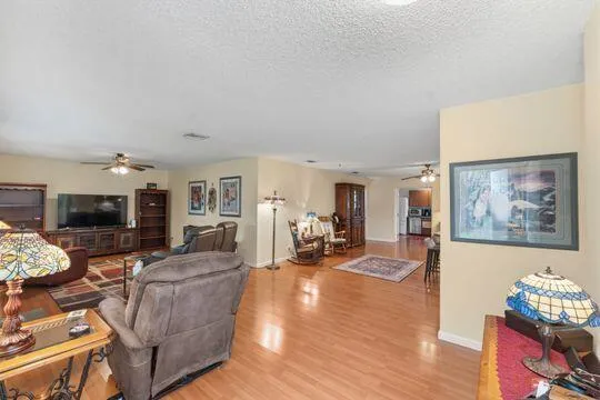 Living room flows to family room/dining room
