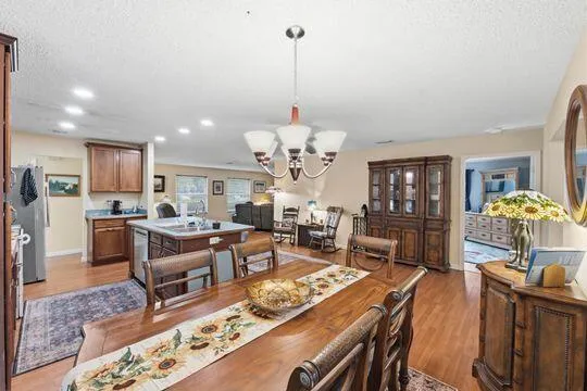 Spacious dining room and/or family room leading to pool area