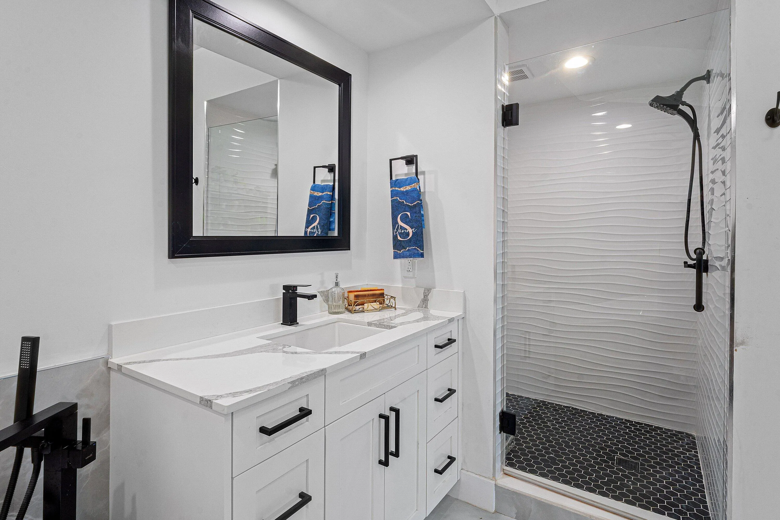 dual sinks and shower