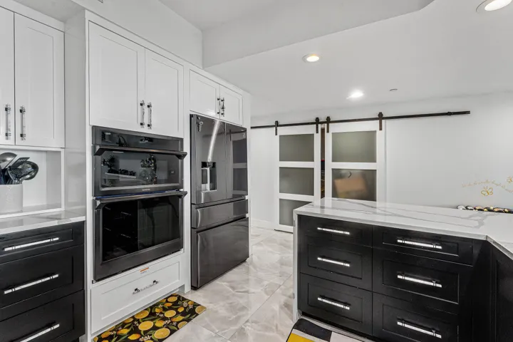 kitchen off of the adjacent den