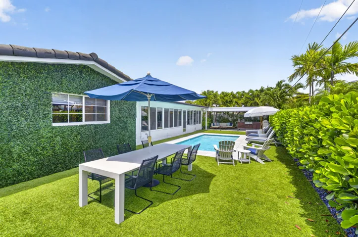Inviting backyard with pool and summer kitchen!