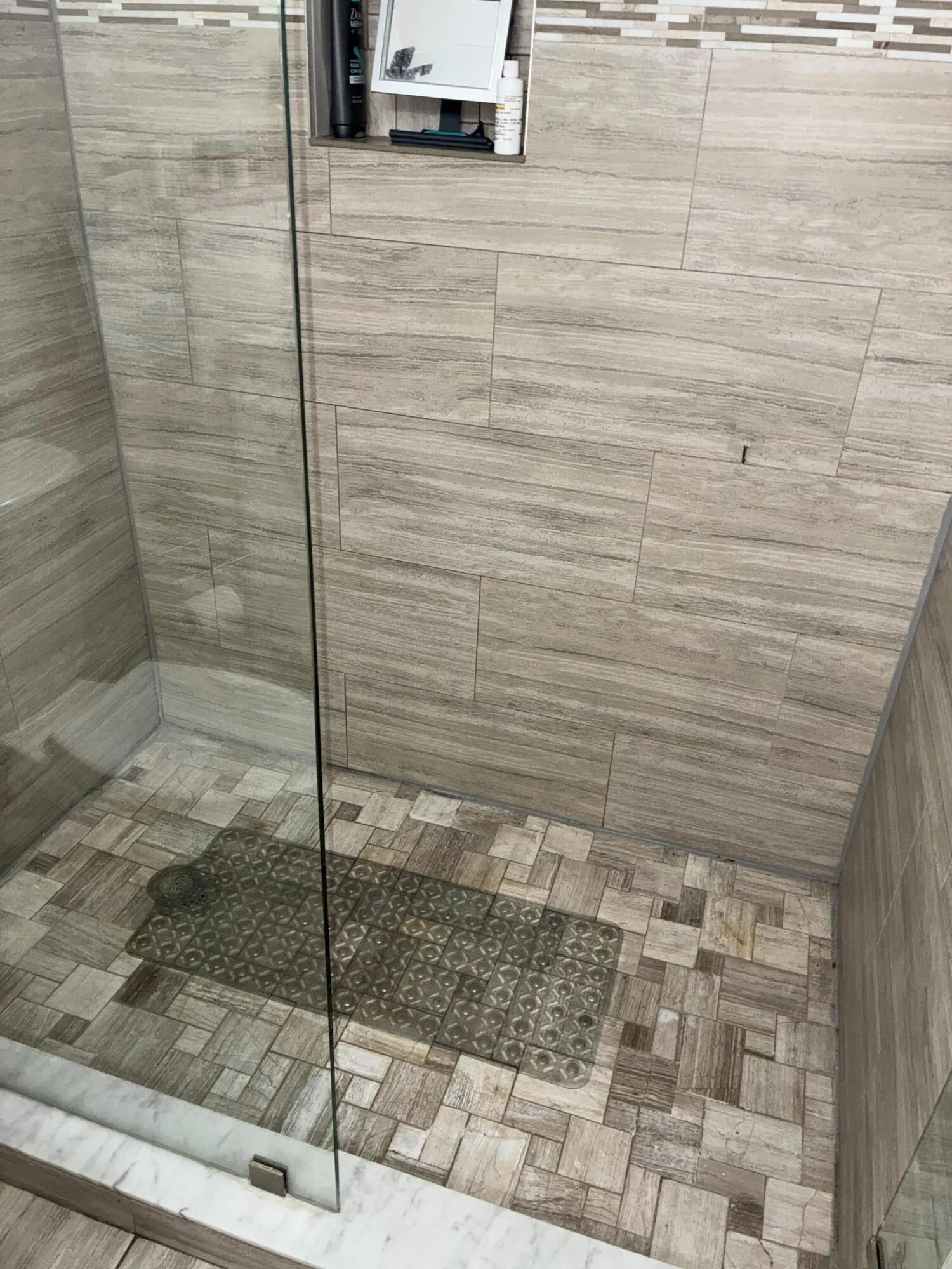 Master bedroom shower with glass