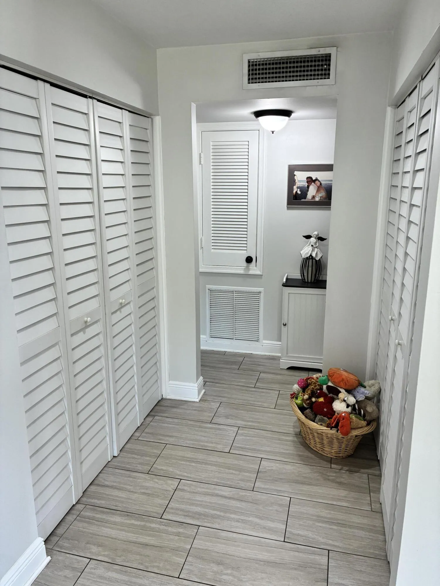 Hallway to master bedroom, office, and large guest bedroom.