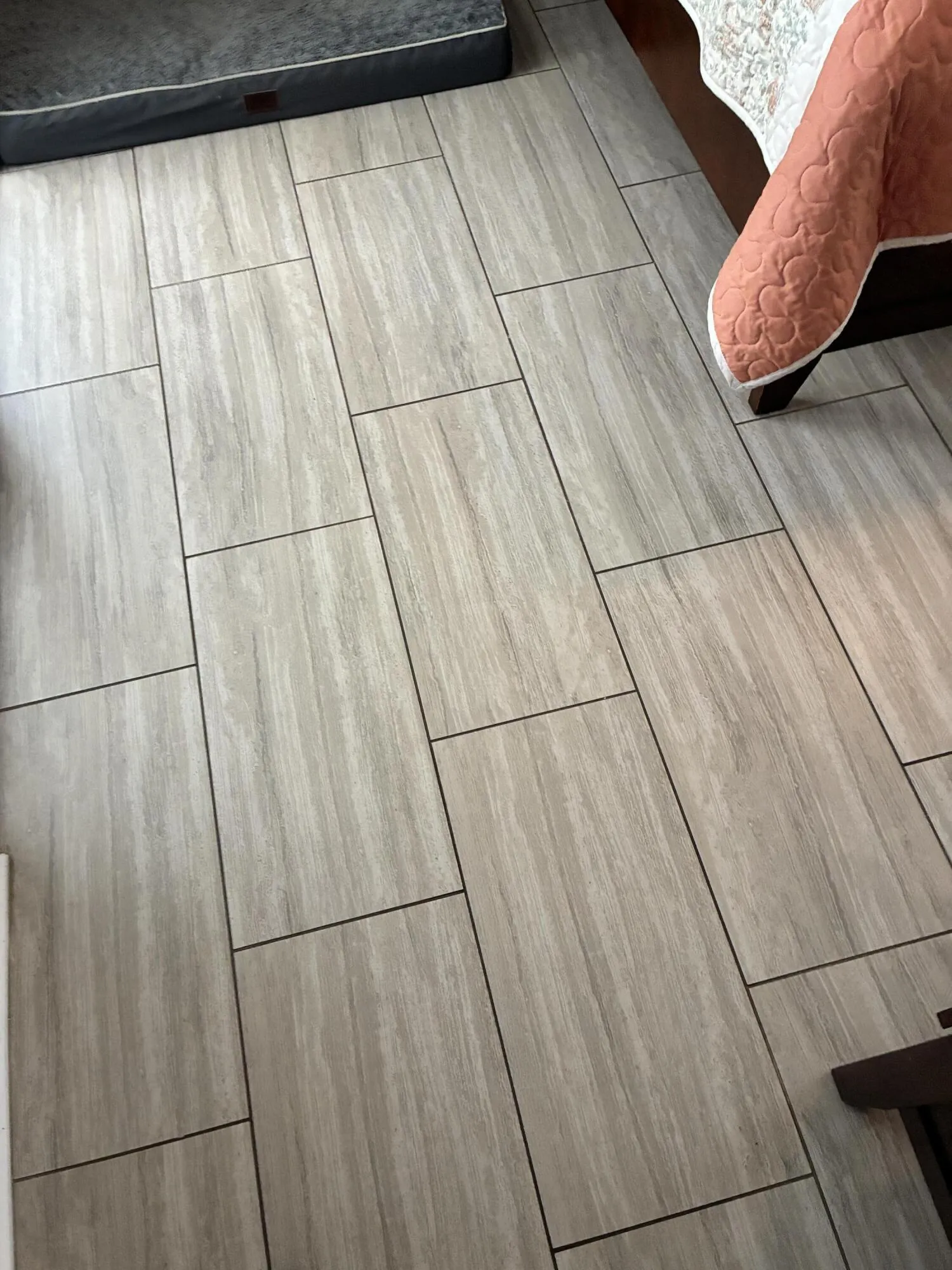 Porcelain, wood flooring. Super Hard, ideal for pets, and durability