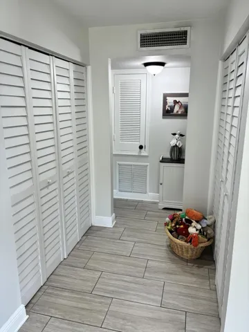 Hallway to master bedroom, office, and large guest bedroom.