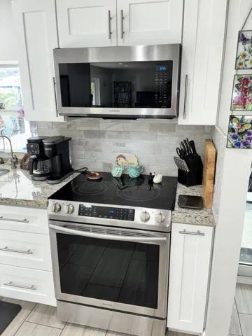 Self-cleaning stainless steel range, with 5 malty width