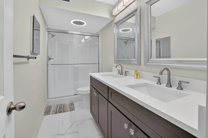Primary Bathroom with Dual Vanities