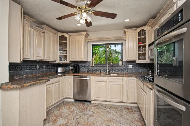 Stainless Steel appliances, granite countertops.