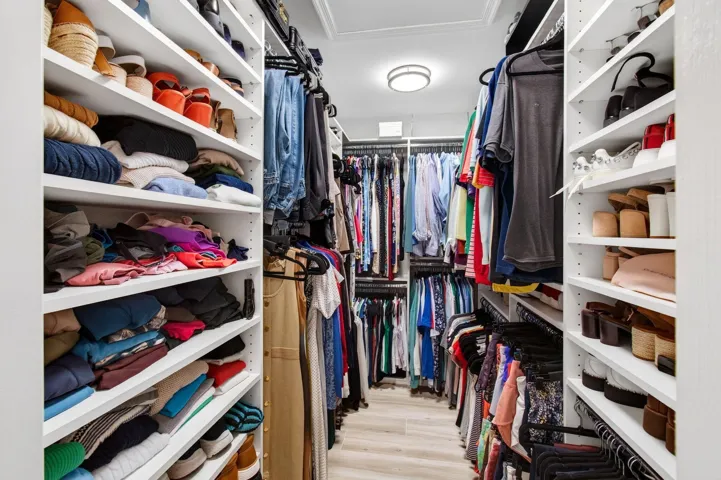 CUSTOM CLOSET IN PRIMARY BEDROOM