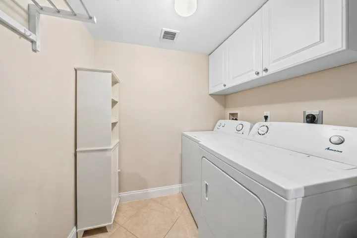 Large laundry room with ample storage