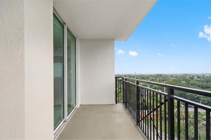 Covered terrace providing a private outdoor extension of the residence with open west-facing views.