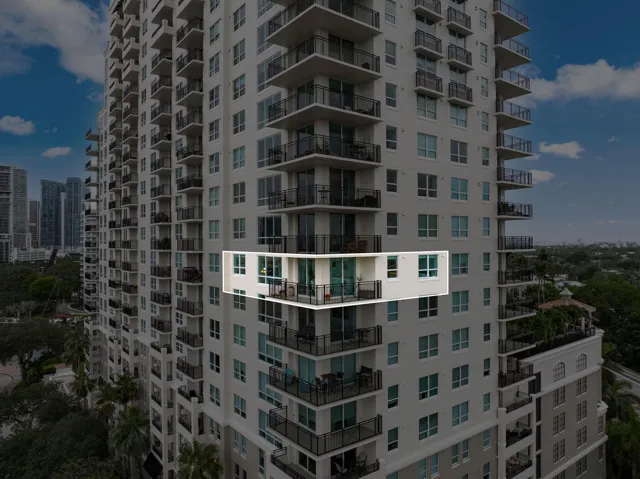 Aerial view of Residence 1013N, a 10th-floor northwest corner residence at The Symphony, distinguished by its generous covered wraparound terrace and multiple exposures.