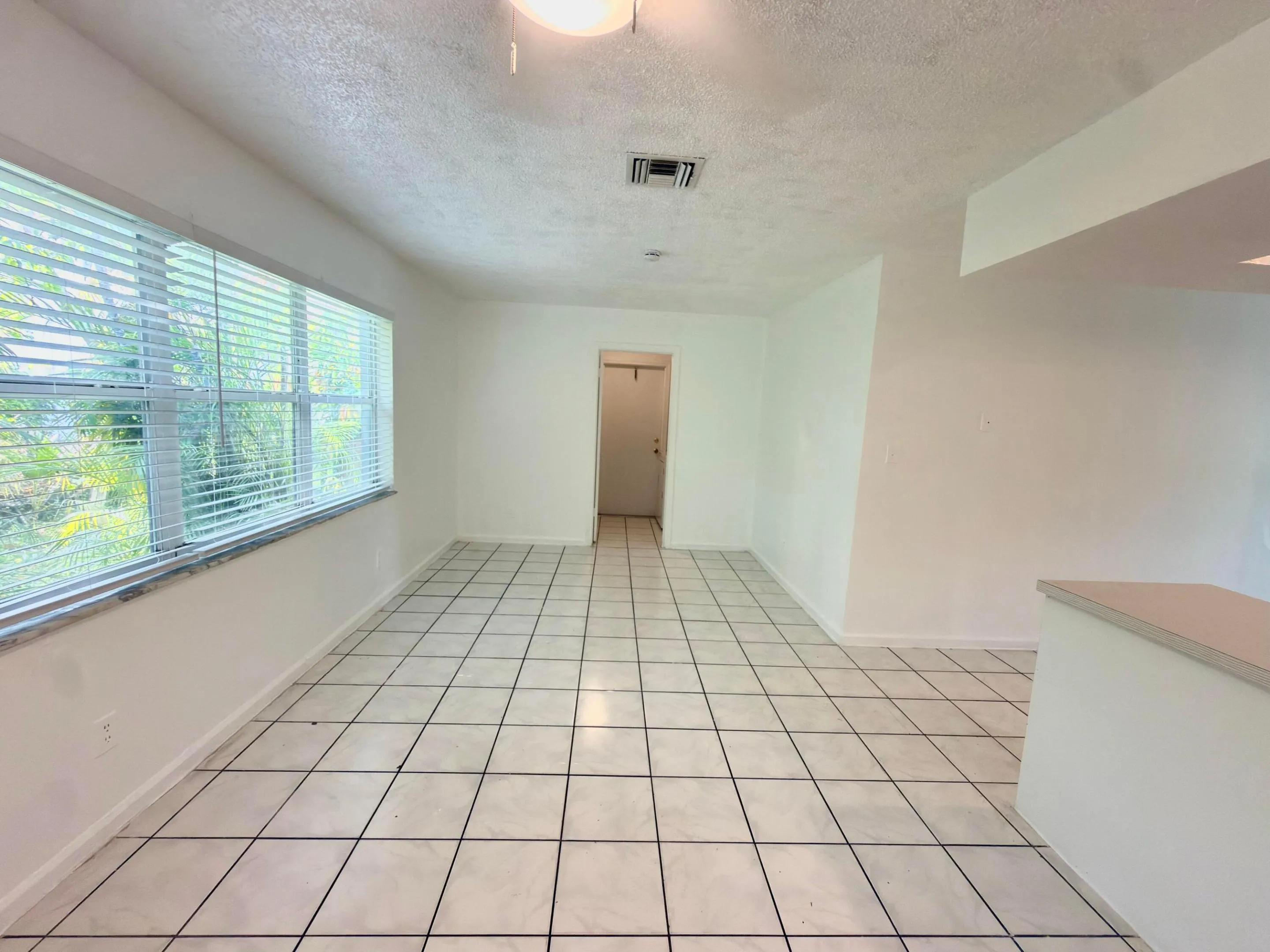dining area view to laundry room