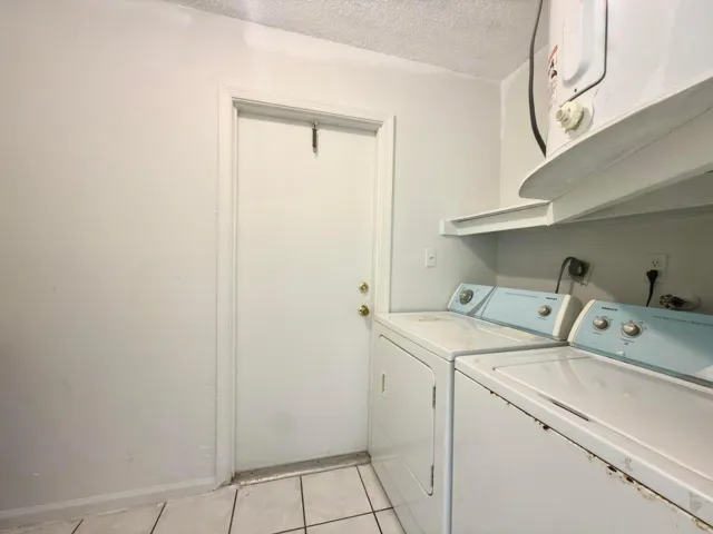 laundry room in unit