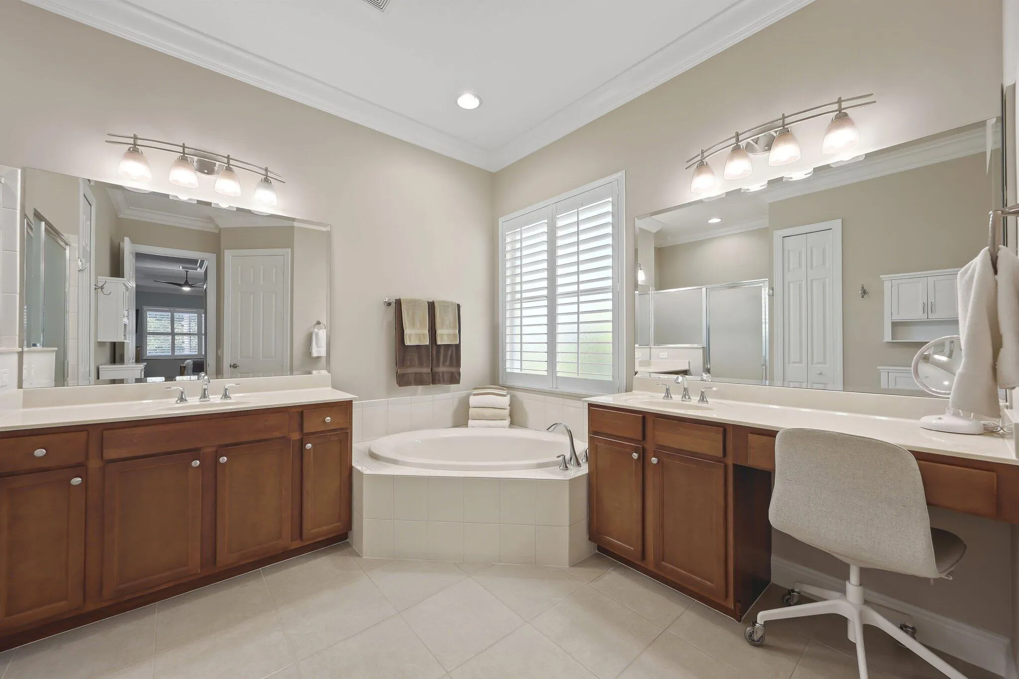Master bath with soaking tub, separate shower and private water closet .
