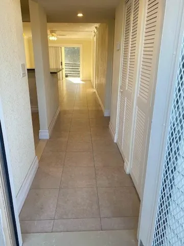 FOYA LEADING TO BALCONY