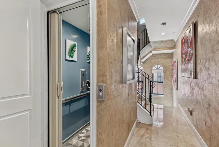 2nd Floor Hallway with custom venetian plaster.