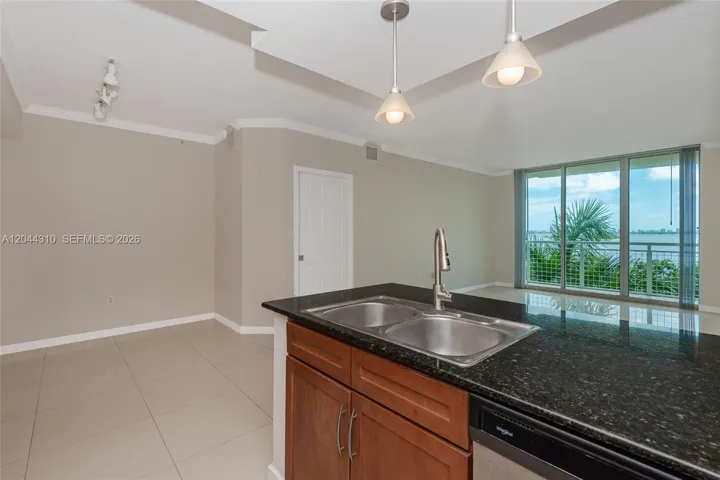 dining area to your dining area to your left, living room with direct bay views