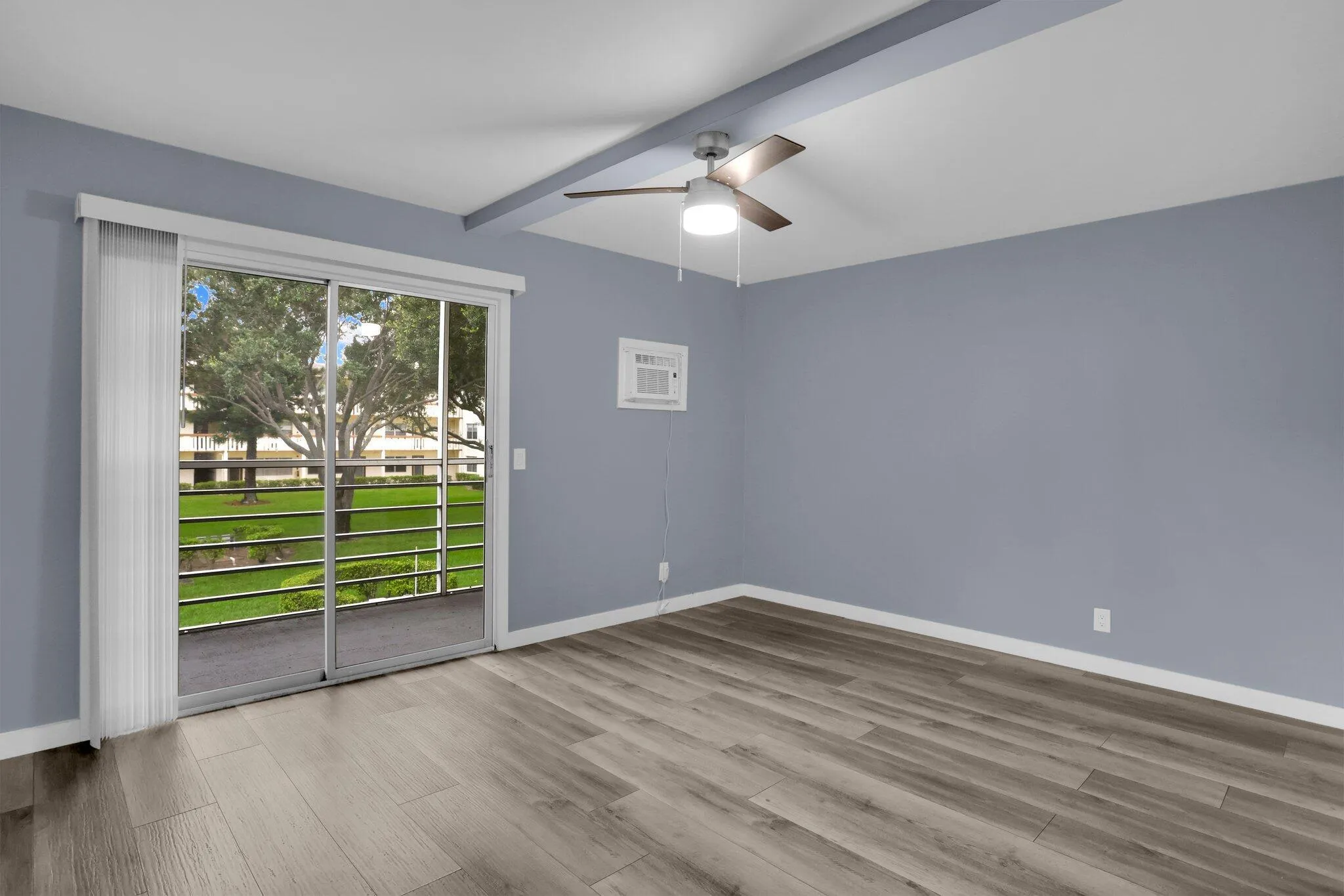 Bedroom with slider to lanai