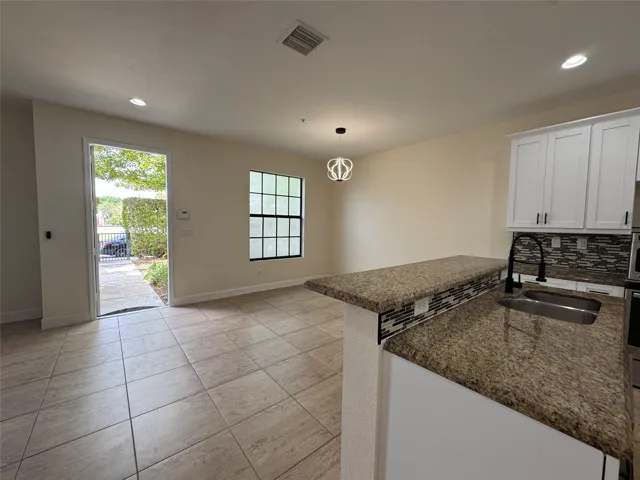 Dining Area, Entrance from the back yard.