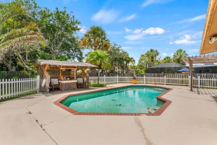 Pool view from other side of home