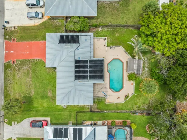 Aerial of Home, Solar Panels paid off for Salt Water pool heating