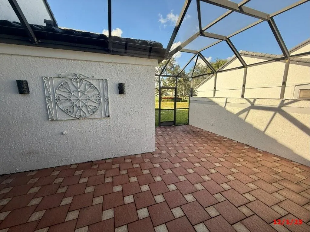 screened patio (at side of home)