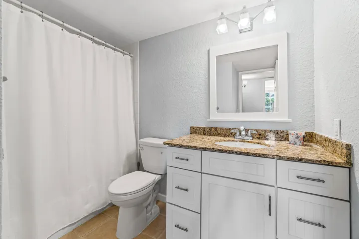 guest bathroom/combo tub