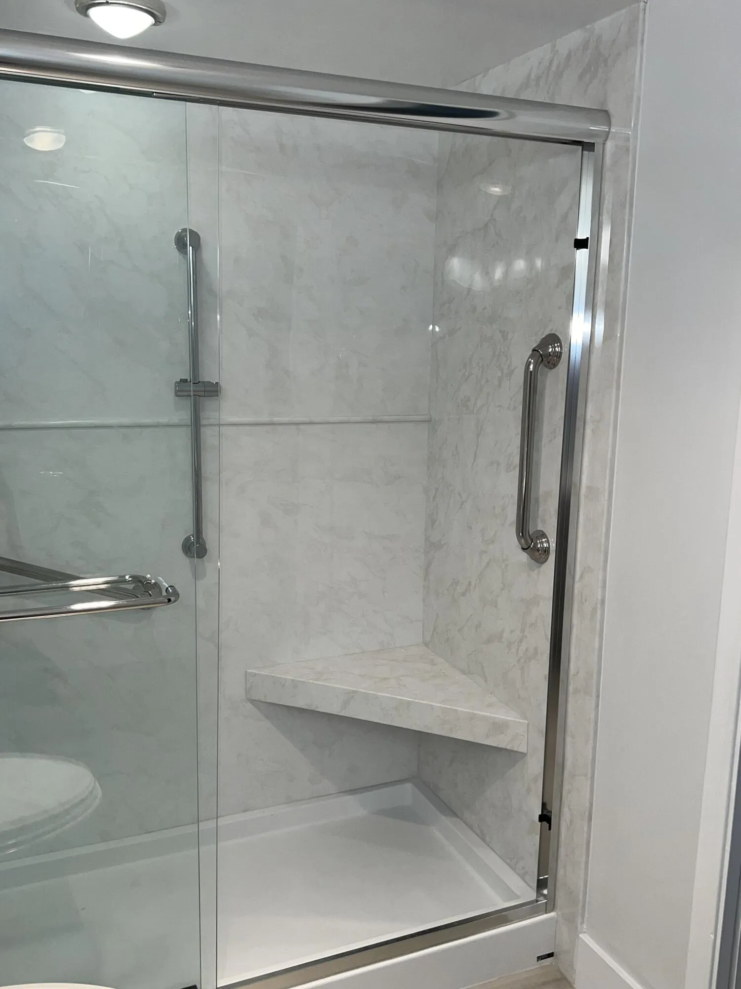 Glass Enclosed Shower with Sitting Bench