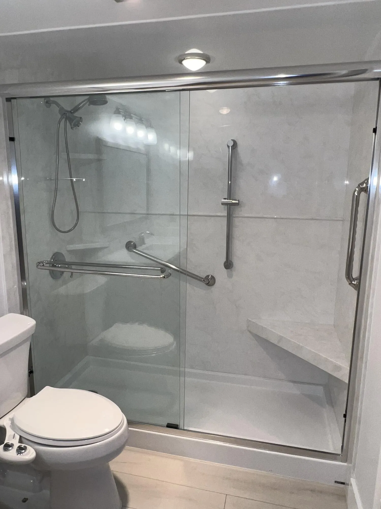 Glass Enclosed Shower with Sitting Bench