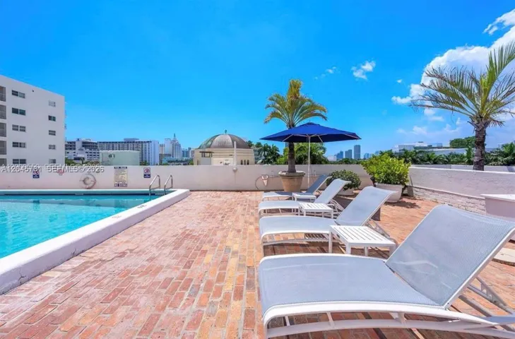 Rooftop terrace featuring a swimming pool,