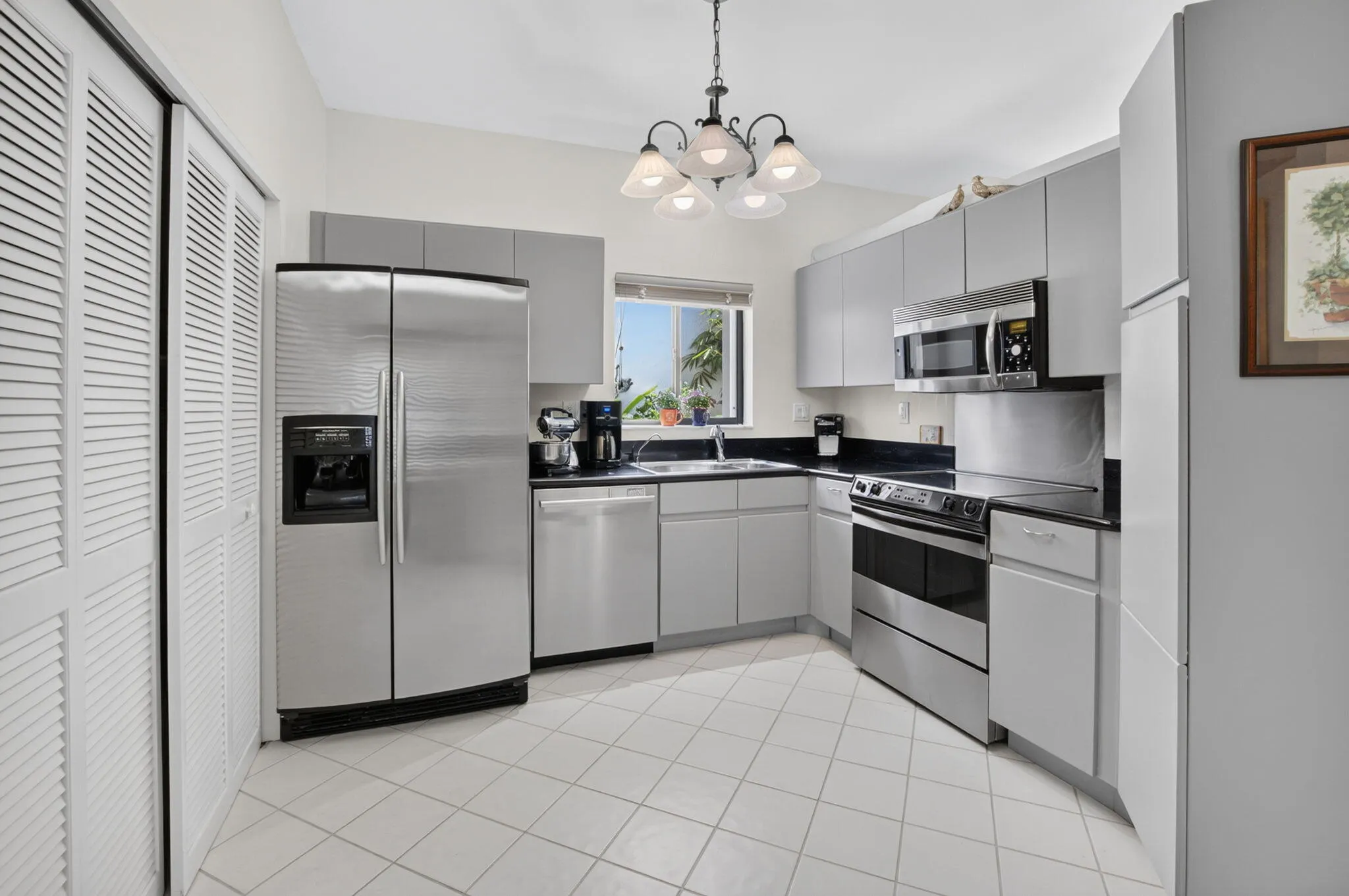 UPDATED KITCHEN WITH CORIAN COUNTERTOPS