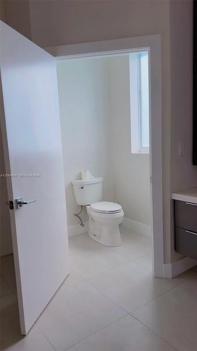 Half bath next to formal dining area Half bath next to formal dining area